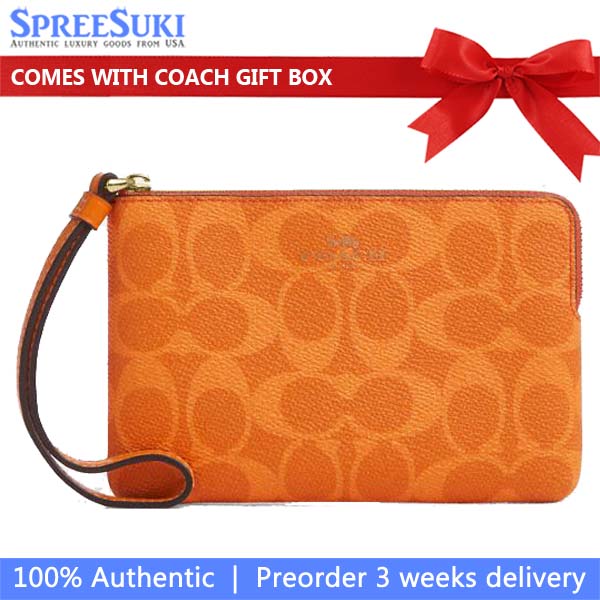 Coach Corner Zip Wristlet In Signature Canvas Bright Mandarin # CAQ75