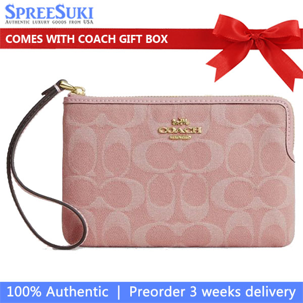 Coach Corner Zip Wristlet In Signature Denim Light Pink Light pink # CDF27