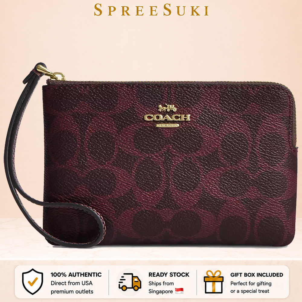 Coach Corner Zip Wristlet In Signature Canvas Black Currant Brown # CEY93